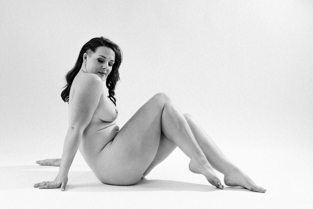 Vancouver Boudoir nude black and white portrait of a women sitting down