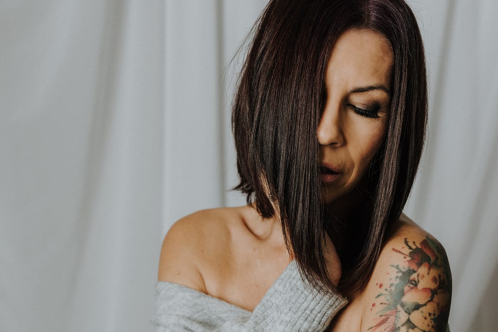 boudoir Portrait of a woman eyes closed. vancouver portrait studio