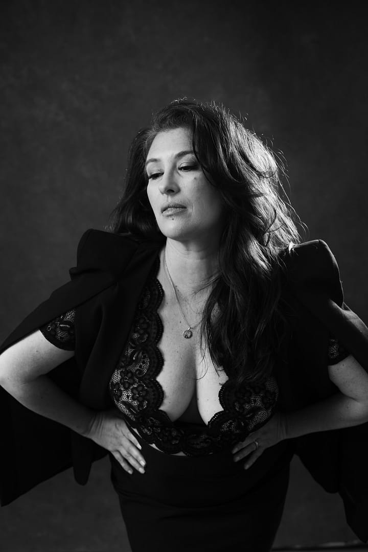 vancouver boudoir image of woman wearing plunging top revealing cleavage