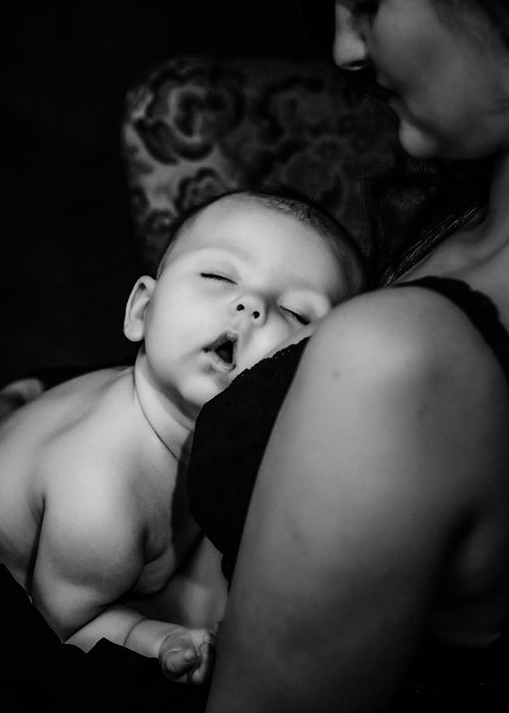 black and white connection portrait of mom holding baby