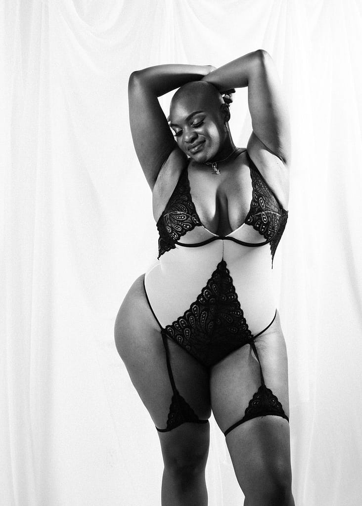 Black and white boudoir portrait of black woman in lingerie, boudoir photography port moody